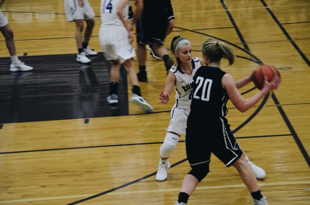 photo of women playing basketball