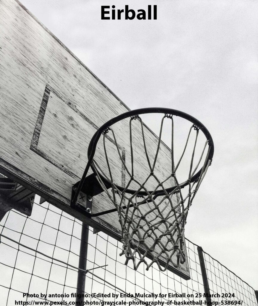 Grayscale Photography of Basketball Hoop